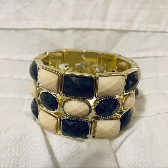 Jewelry - Statement piece large plastic stretch cuff bracelet.   Gold tone trim/edging